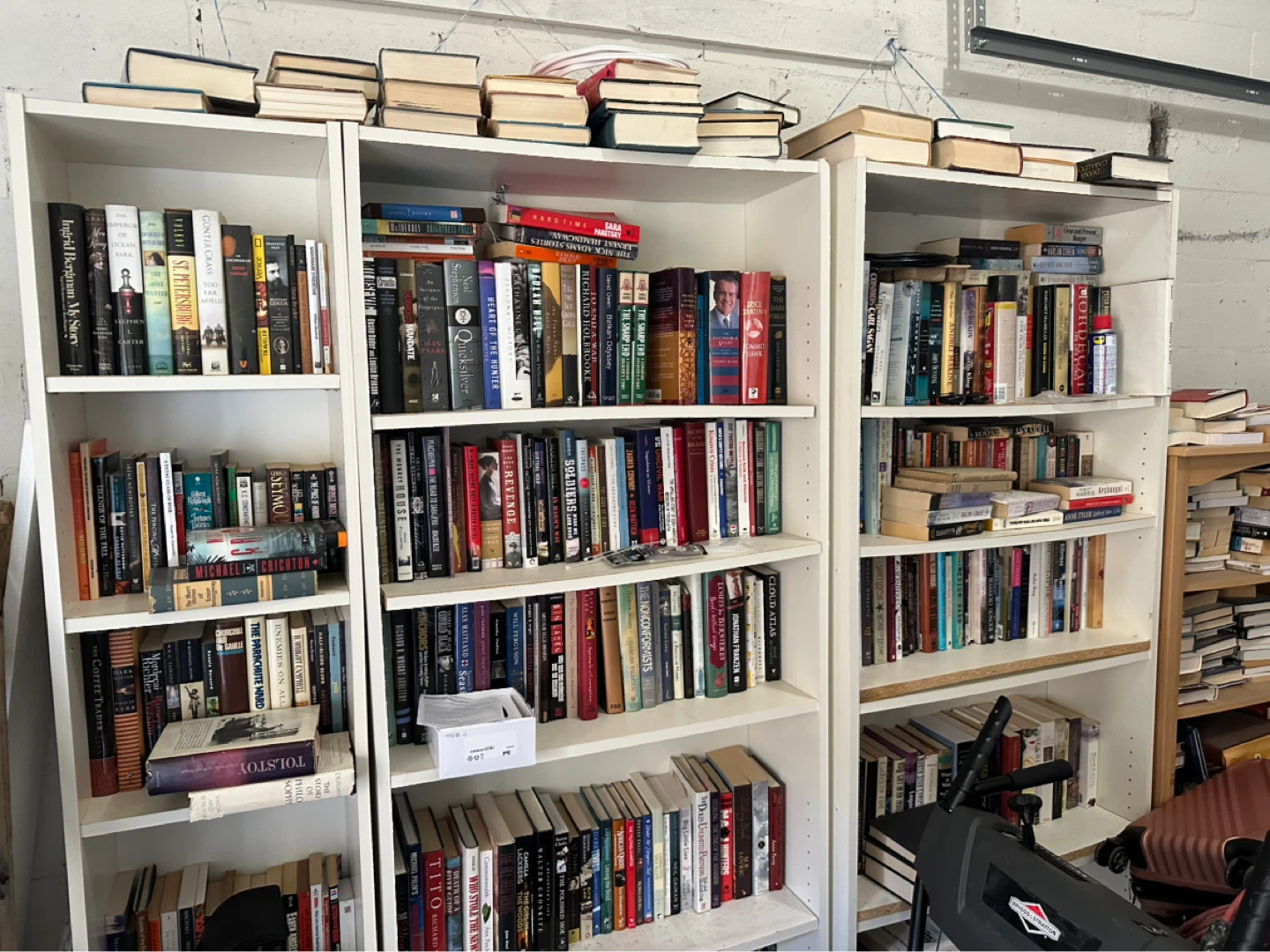 Assorted Books on Shelves - photo 2