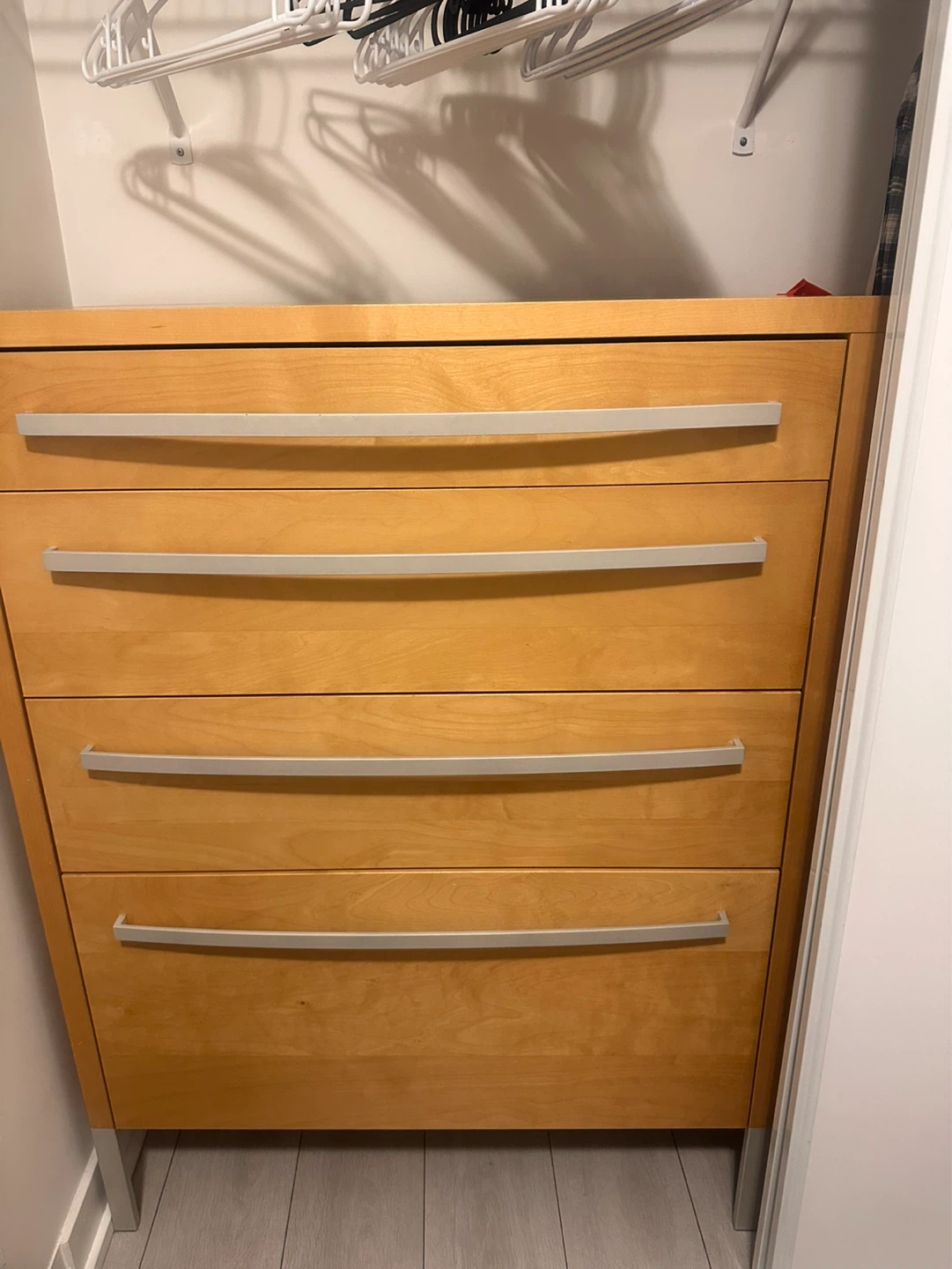 Wooden 4-drawer dresser with silver handles