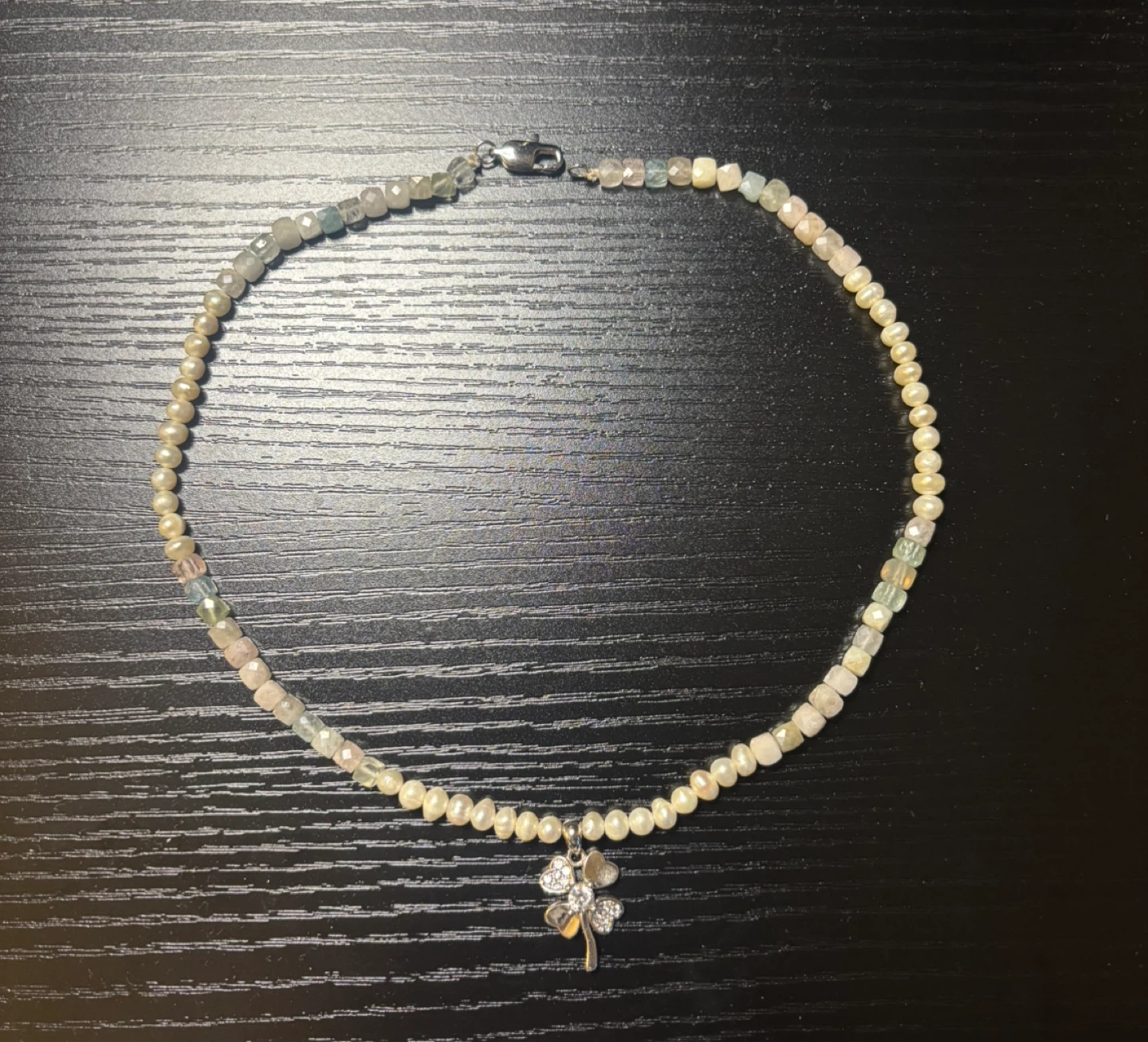 Pearl and gemstone necklace with clover pendant