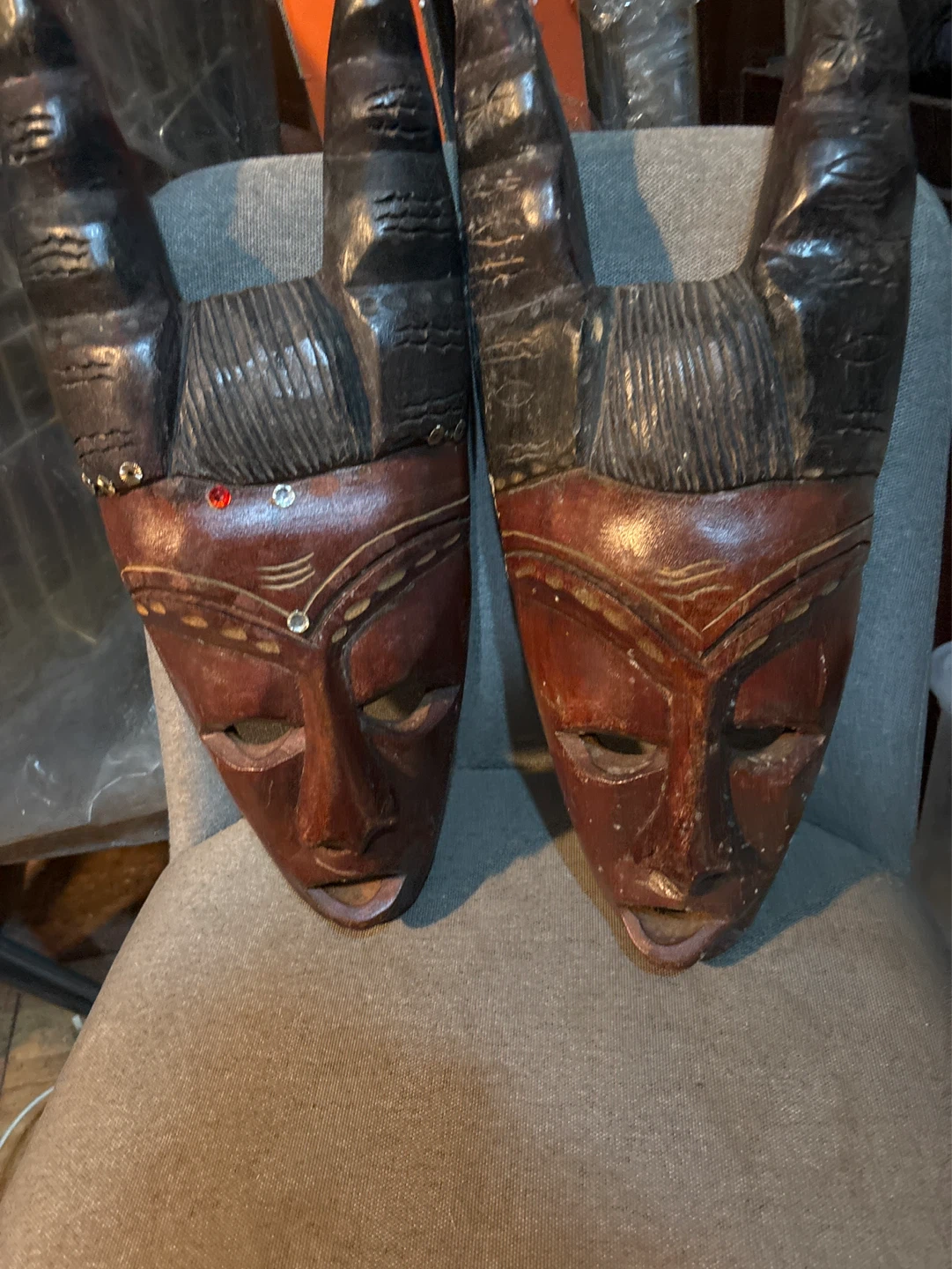 Pair of Wooden Tribal Masks with Horns