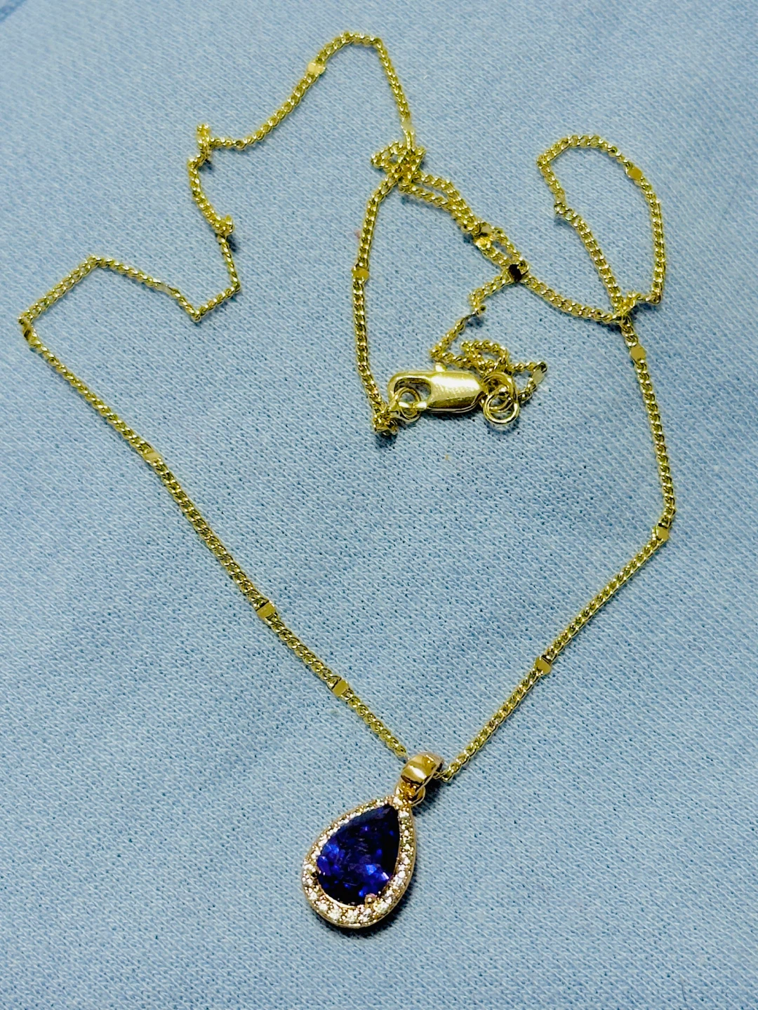 Gold Pendant Necklace with Blue Gemstone and Diamonds - photo 2