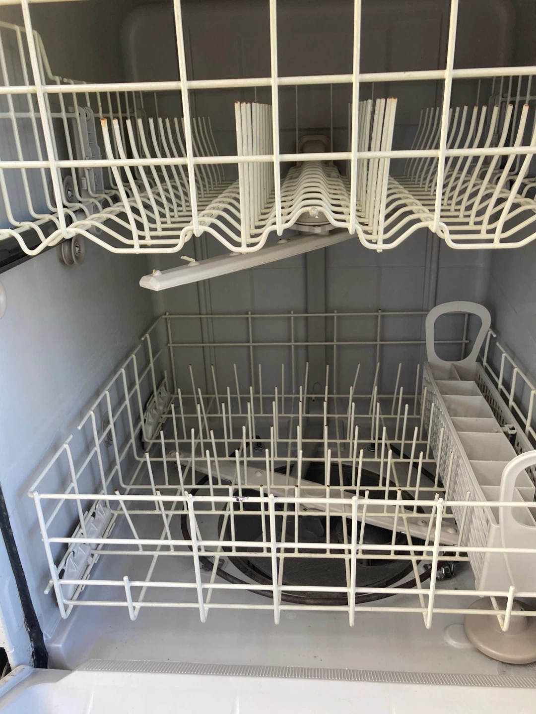 Whirlpool Black Dishwasher with wood counter top