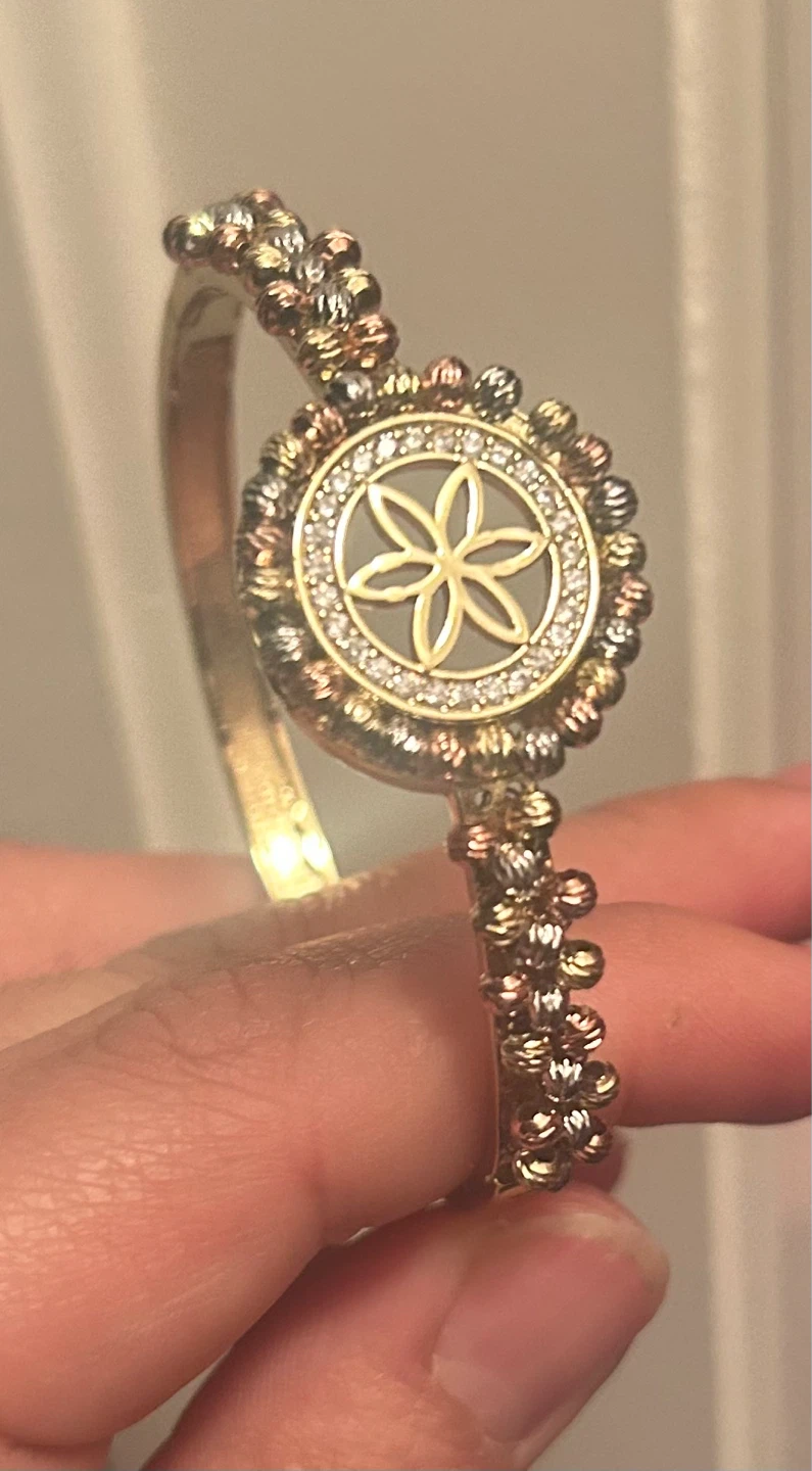 Gold Tone Bangle with Flower Charm