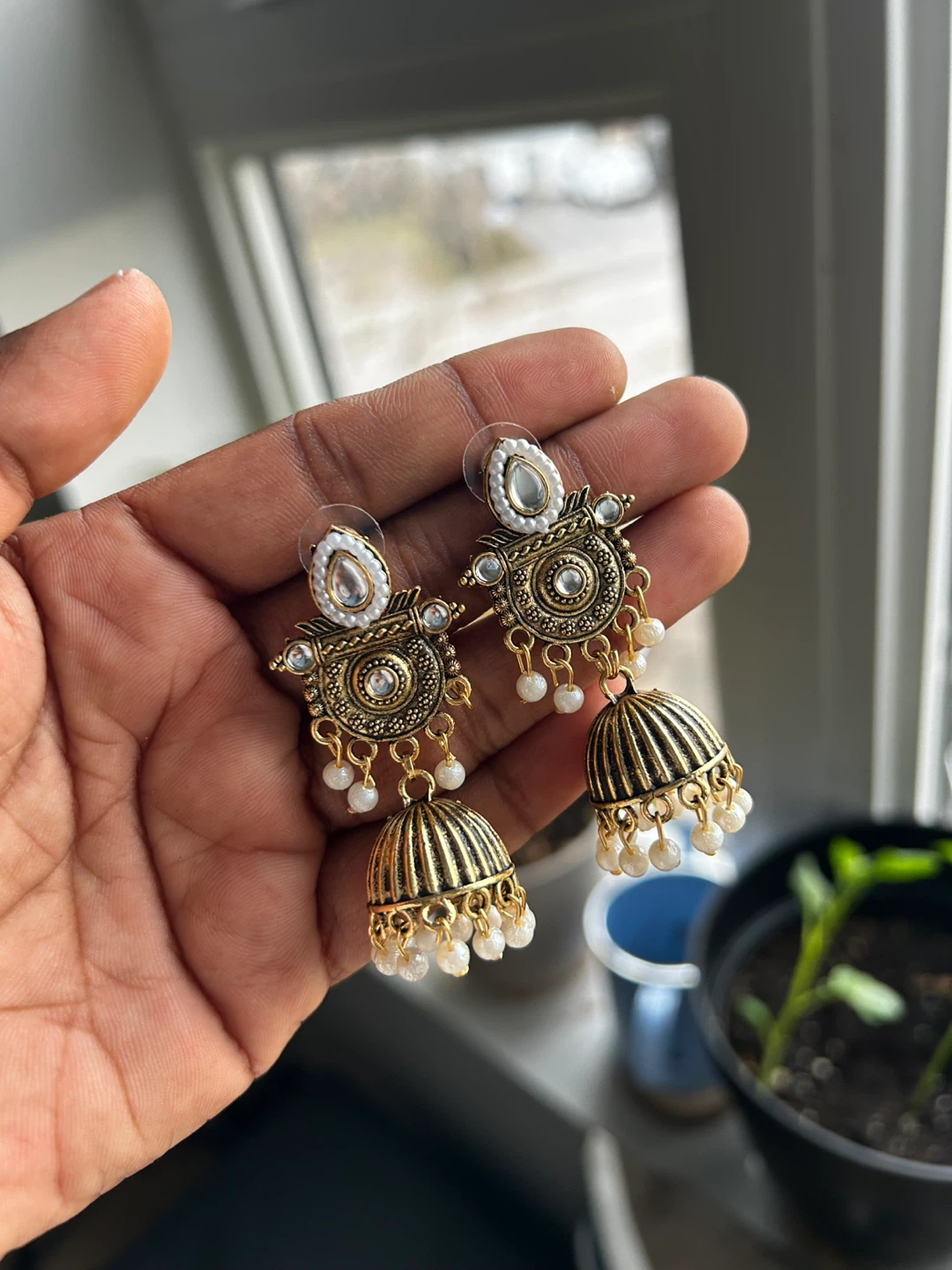Gold-tone Jhumka Earrings with White Beads