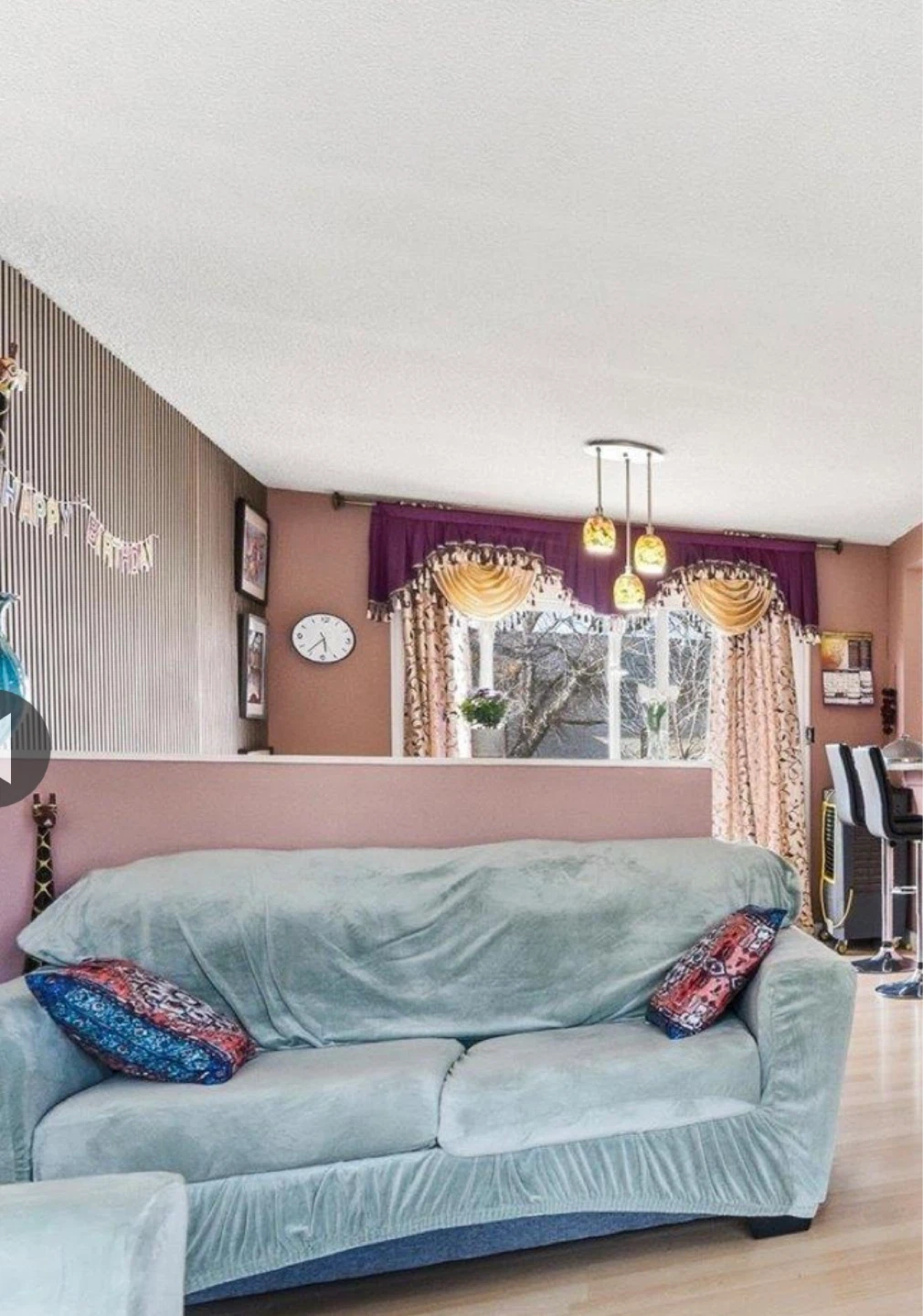 Light Blue Sofa with Patterned Pillows - photo 2