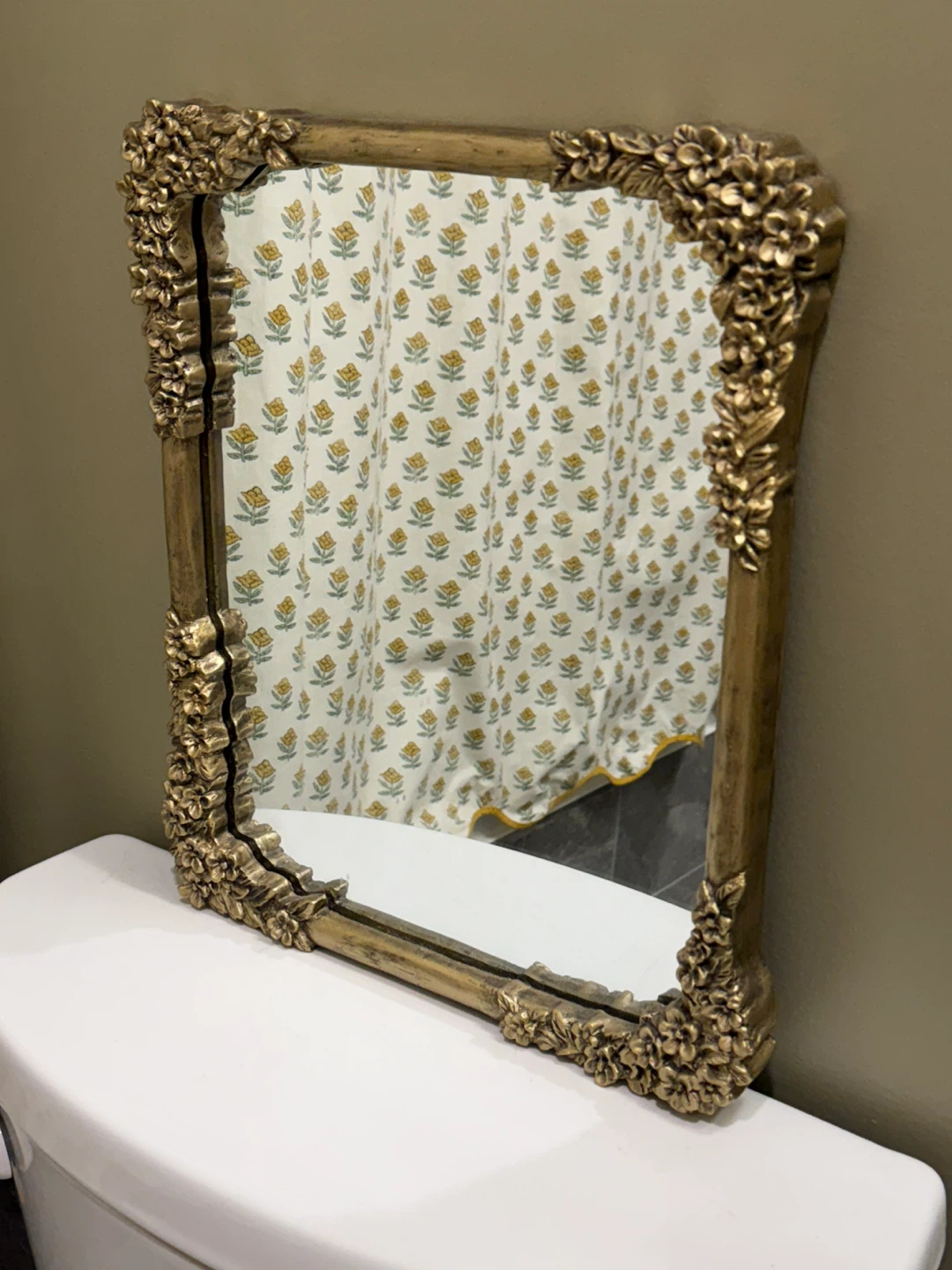 Ornate floral framed mirror