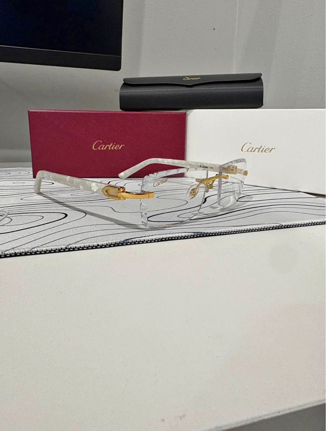 Cartier Rimless Eyeglasses with White Accents