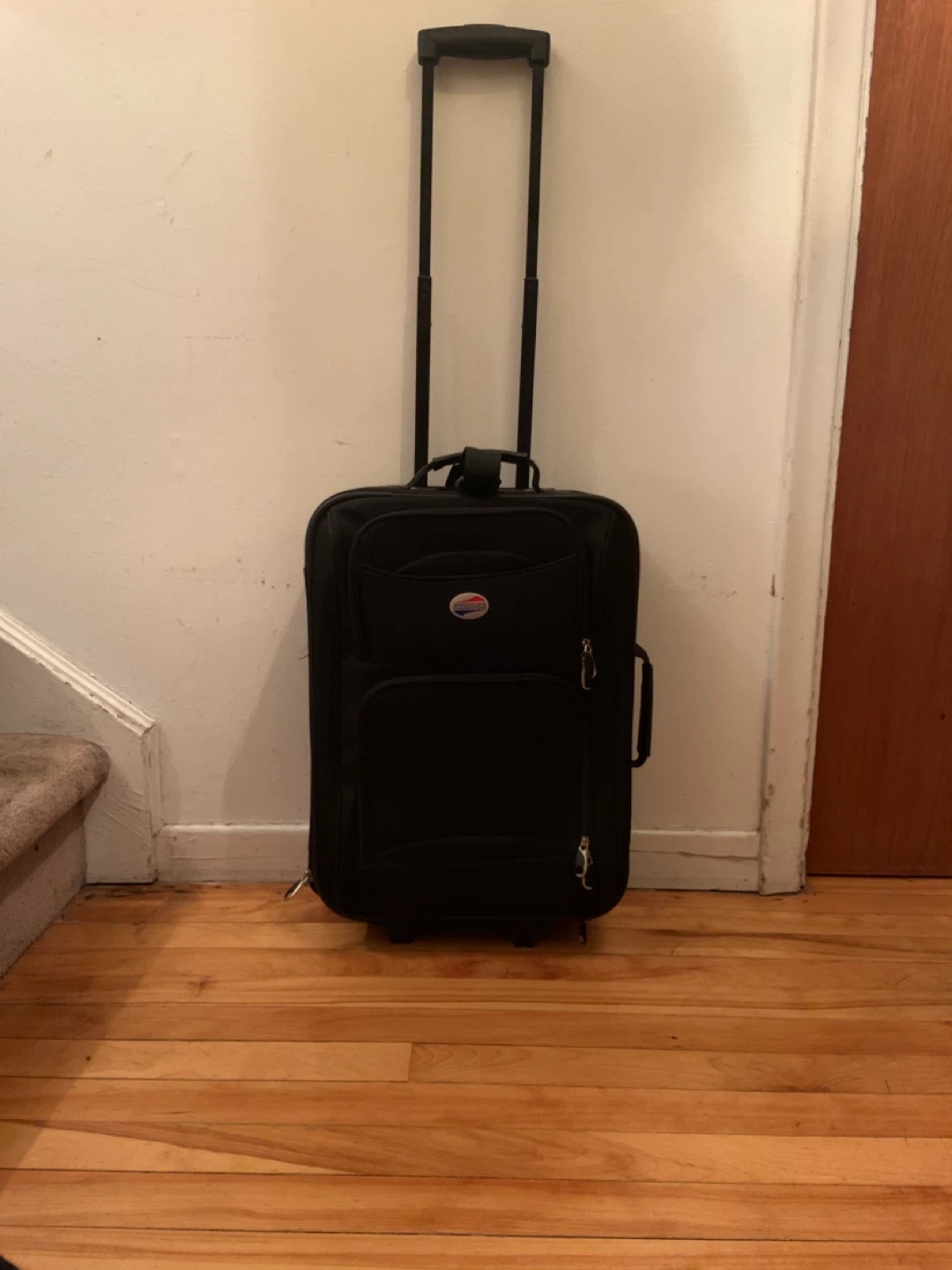 American Tourister Carry On Rolling Suitcase