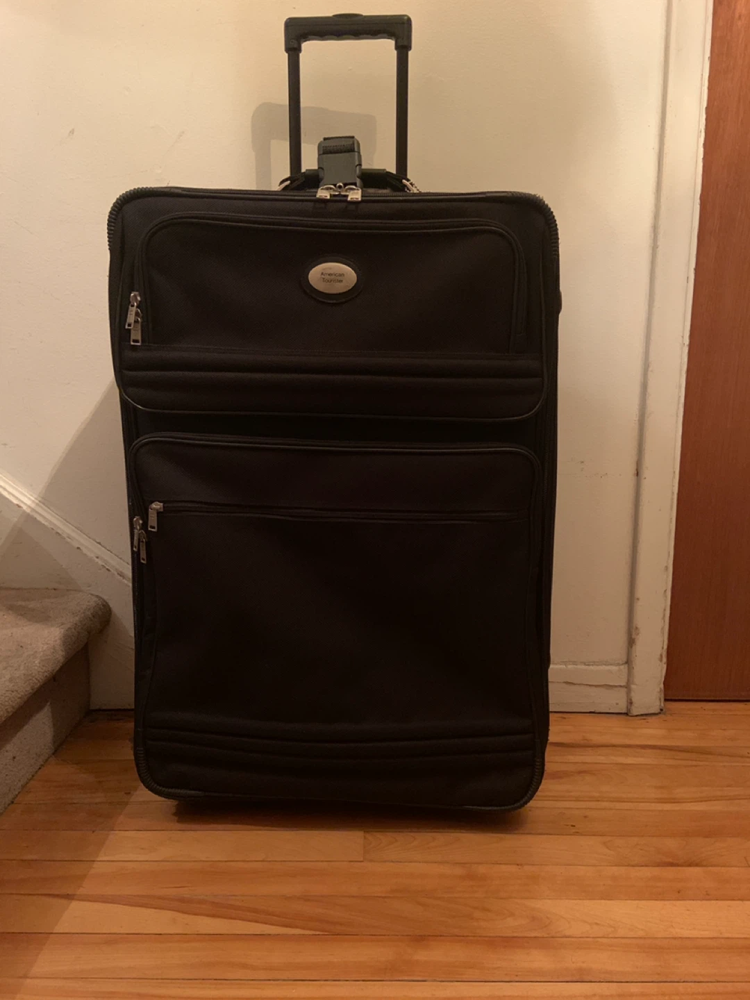American Tourister Large Rolling Suitcase