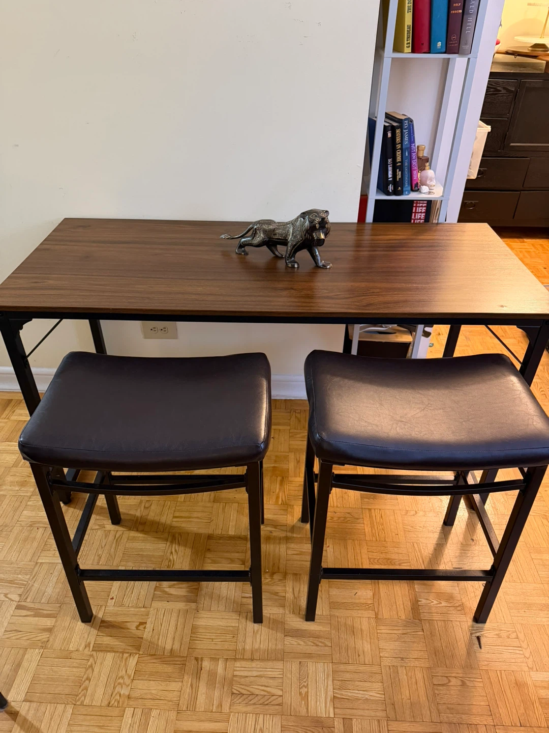 Two-piece bar set with dark wood top and black frame