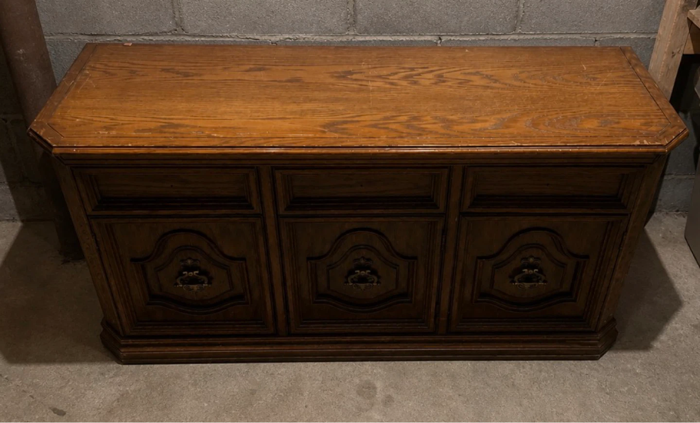 Wooden storage cabinet with decorative drawers