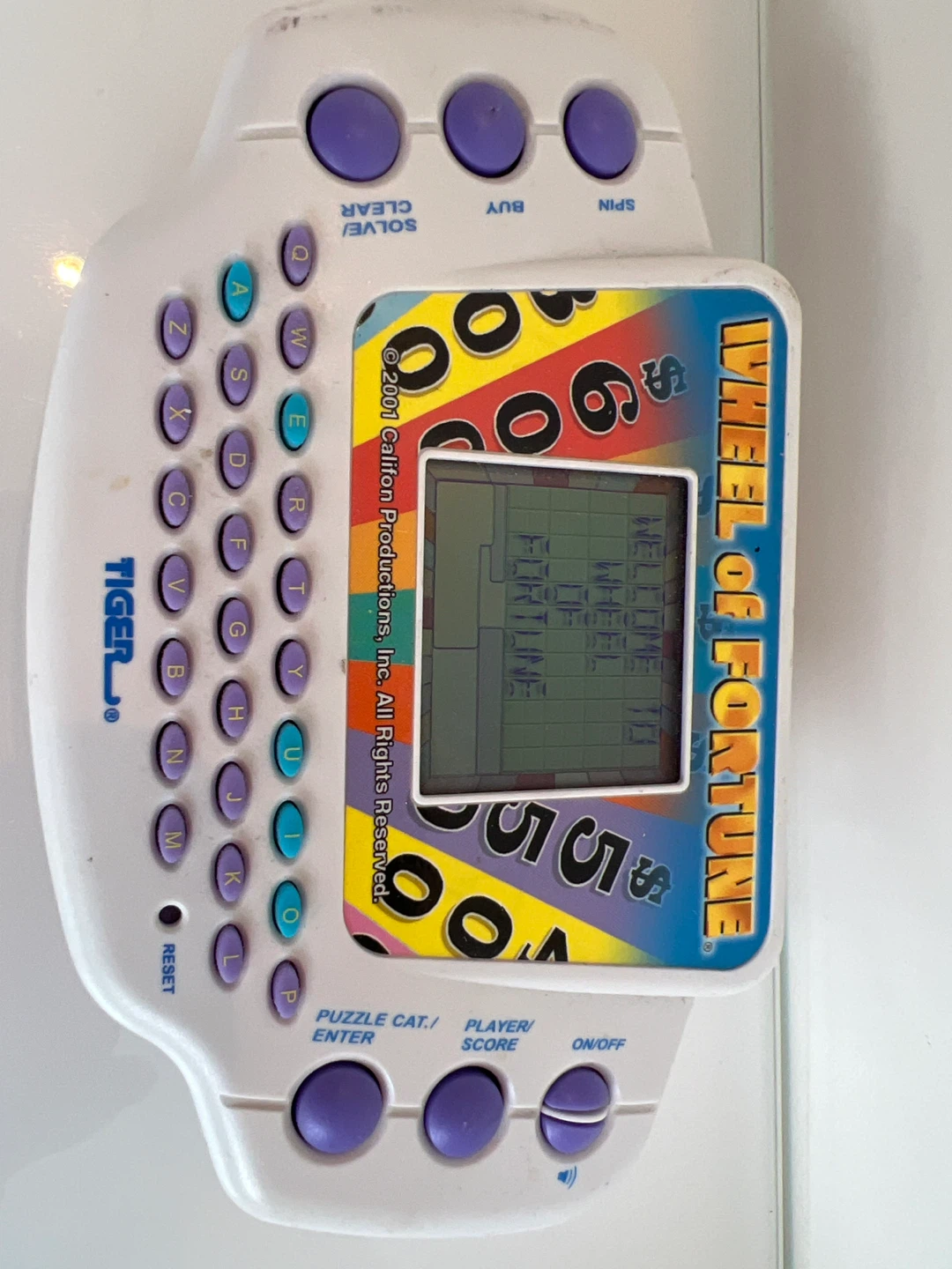Tiger Electronics Wheel of Fortune Electronic LCD Game - photo 4