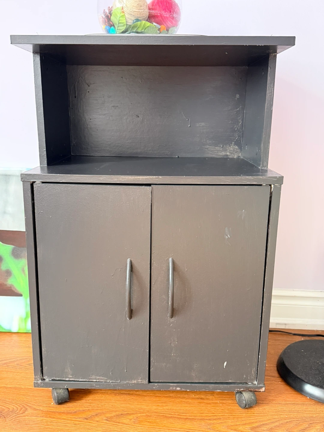 Small dark wood accent cabinet with wheels - photo 3