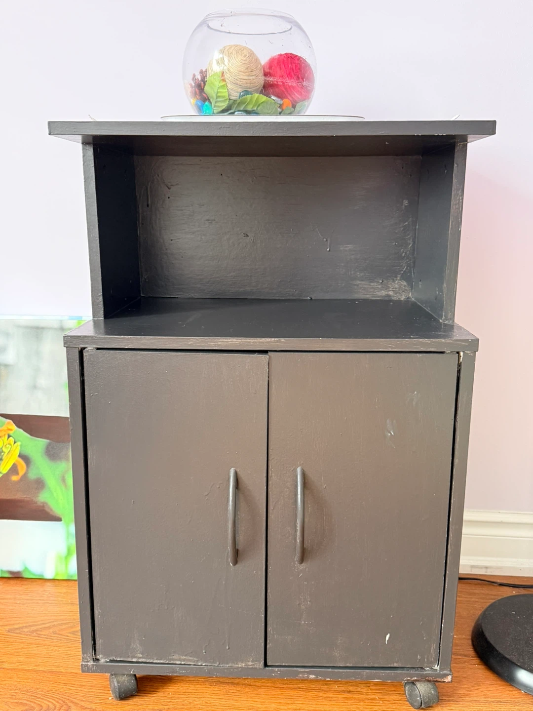 Small dark wood accent cabinet with wheels - photo 4