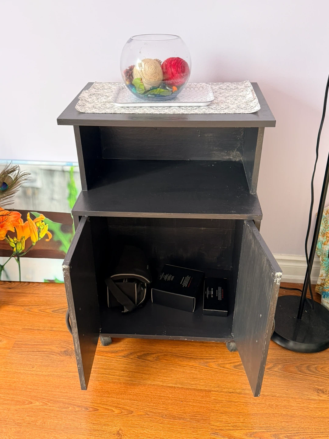 Small dark wood accent cabinet with wheels - photo 2