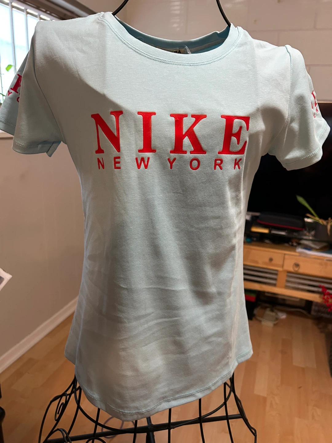 Light Blue T-Shirt with Embroidered Logos