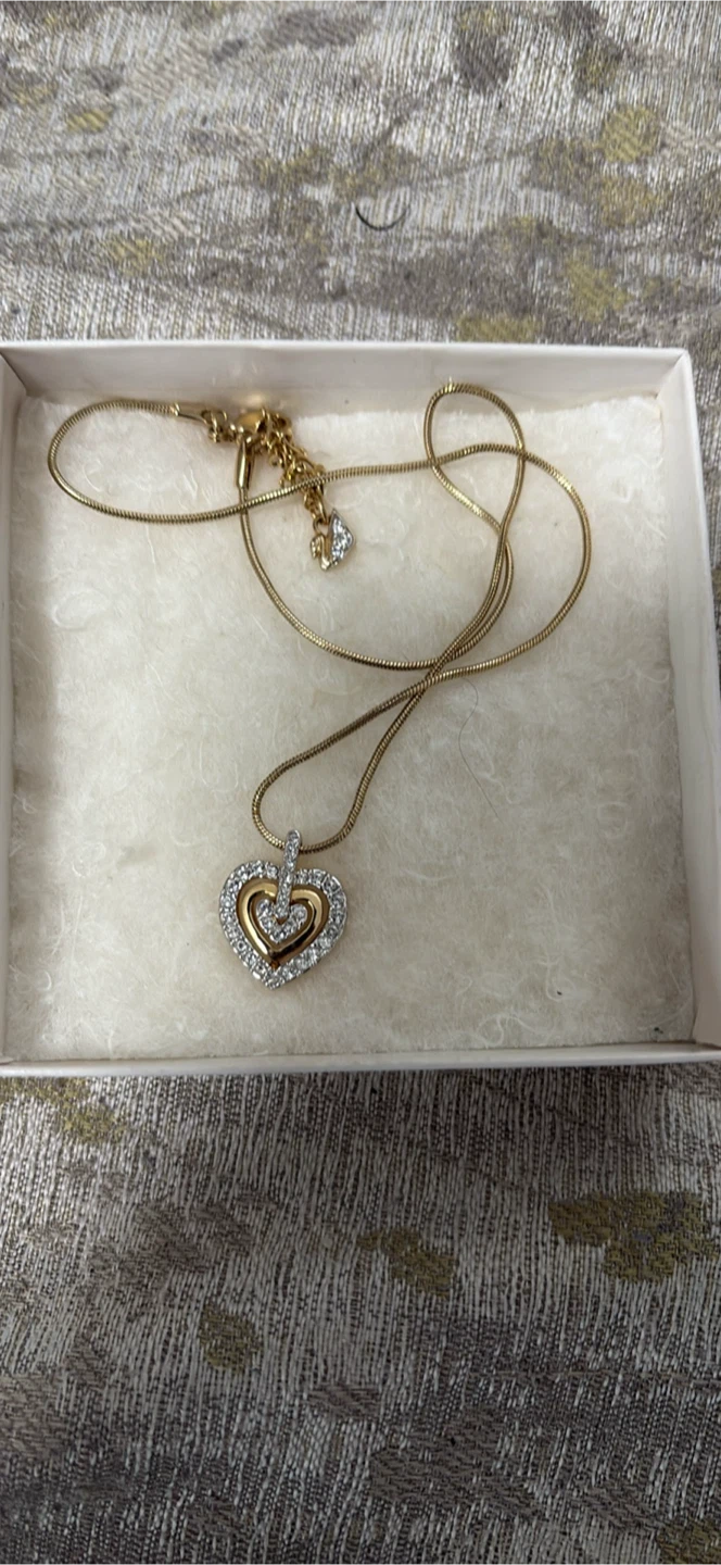 Gold-tone heart necklace with crystals