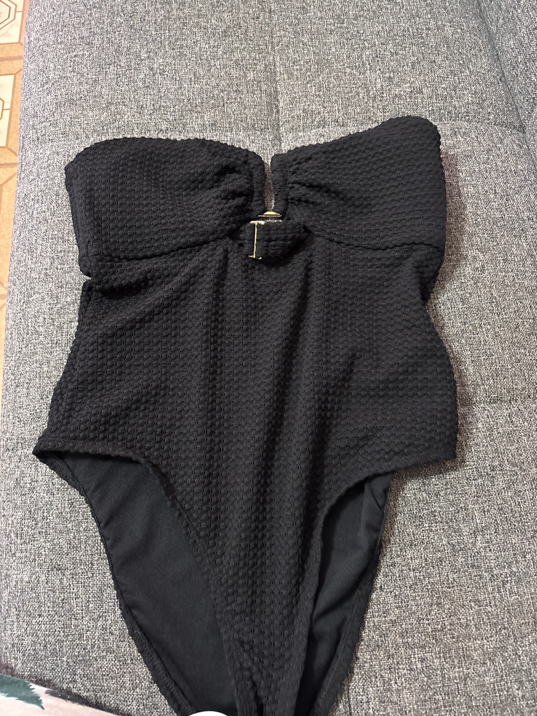 Black Strapless Swimsuit with Gold Hardware