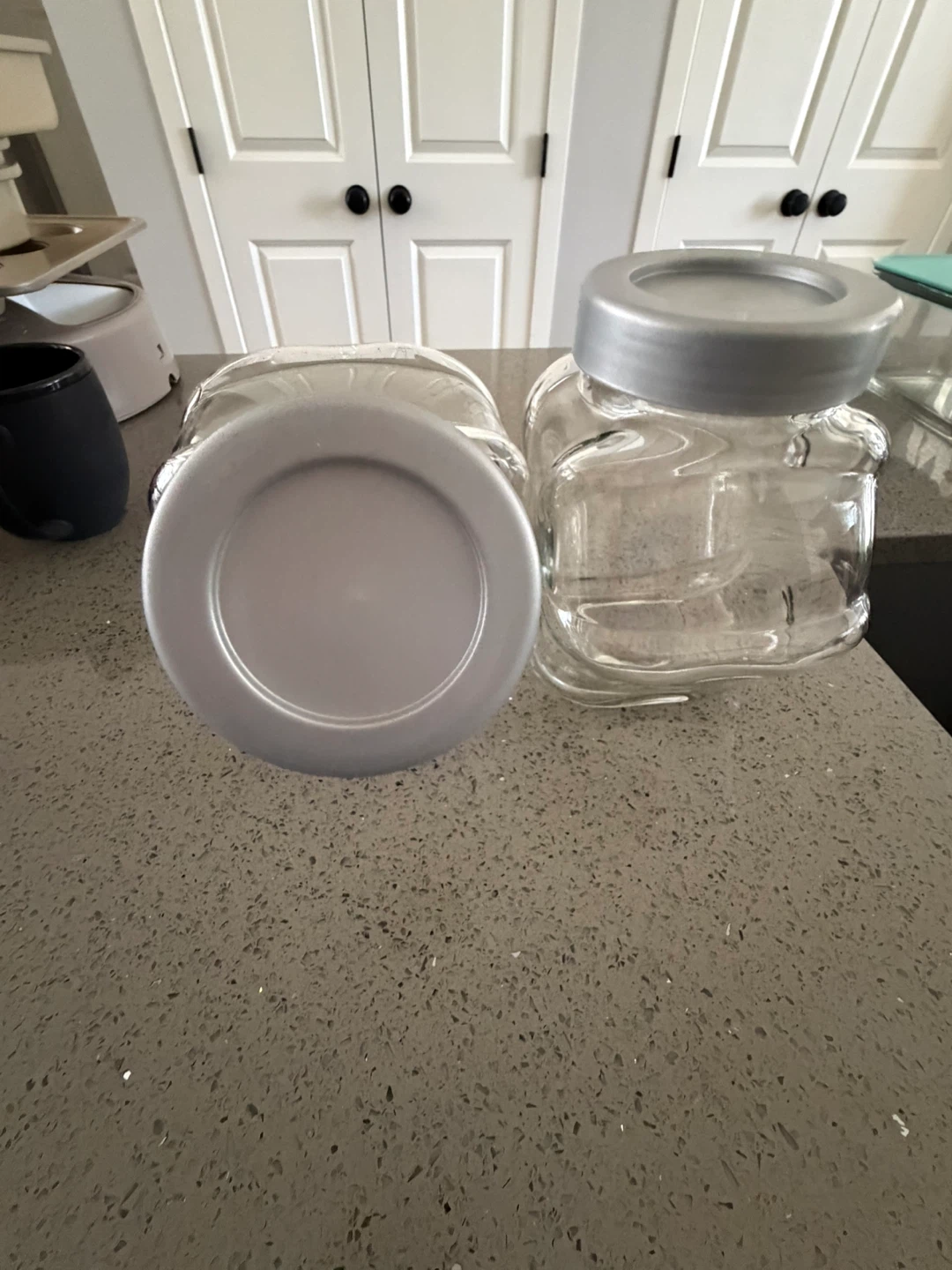 Set of 2 Glass Canisters with Silver Lids