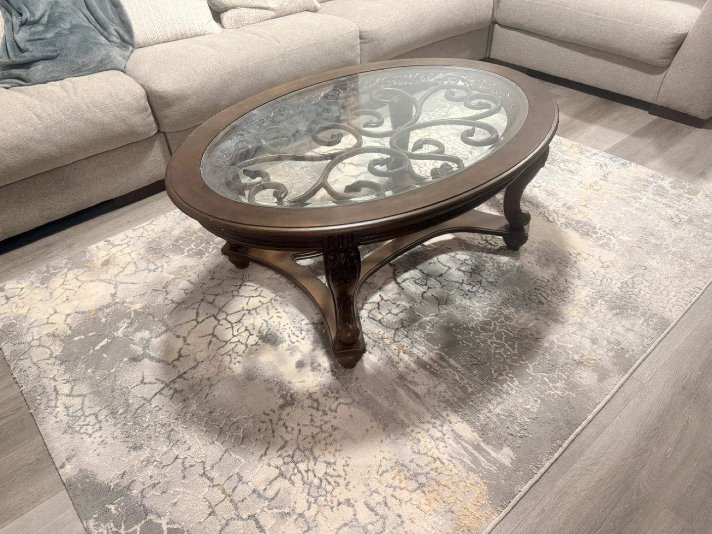 Ornate Oval Coffee Table with Glass Top