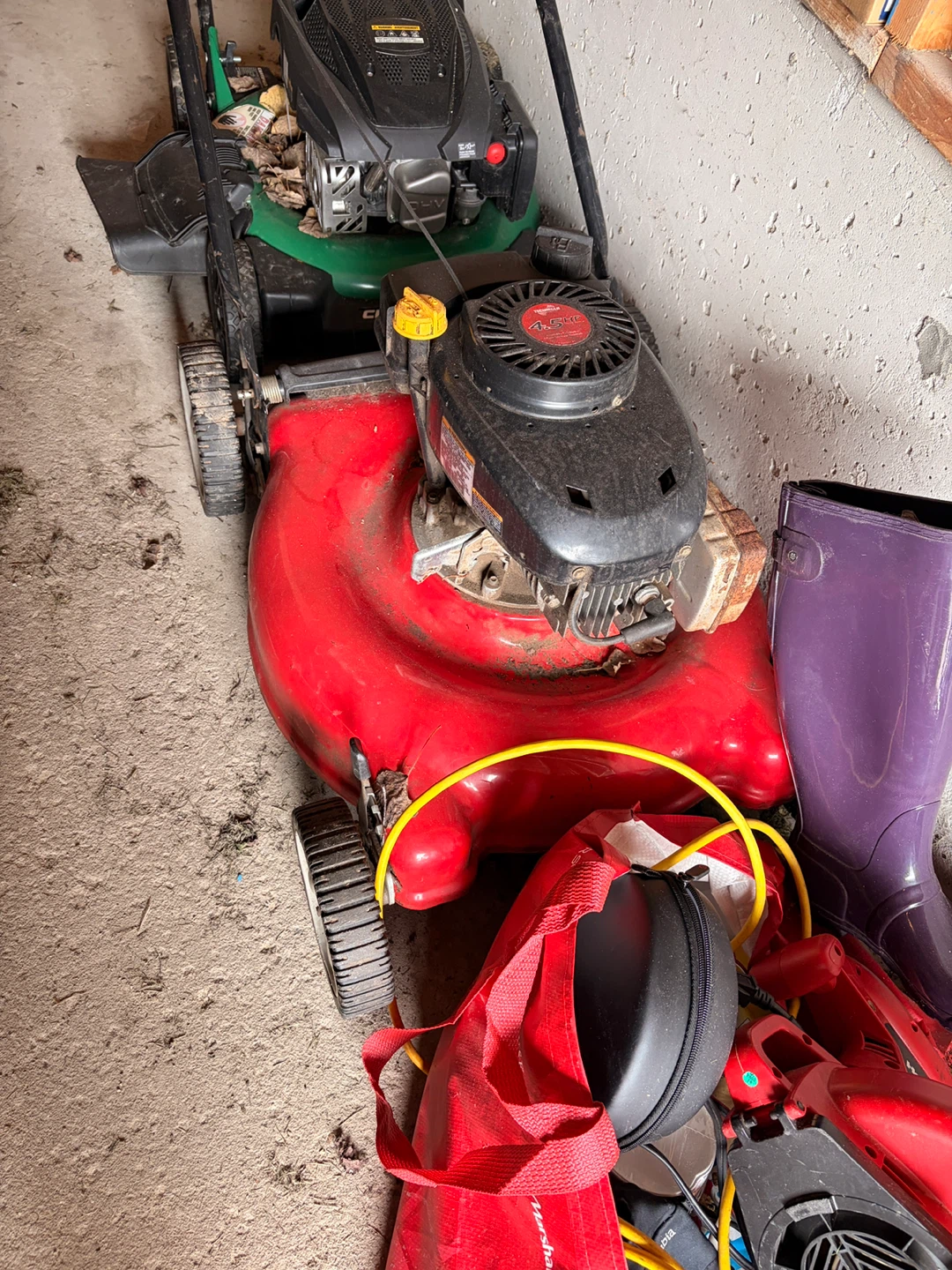 (Missing pin/needs repair) Used Red Lawn Mower