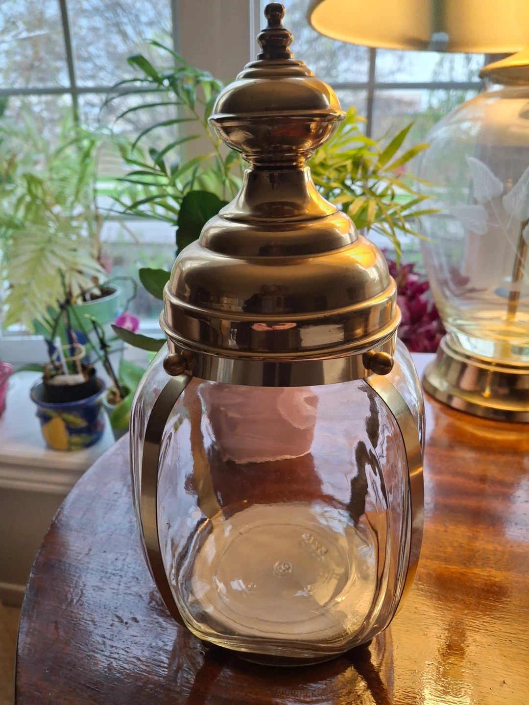 Vintage glass jar with brass accents