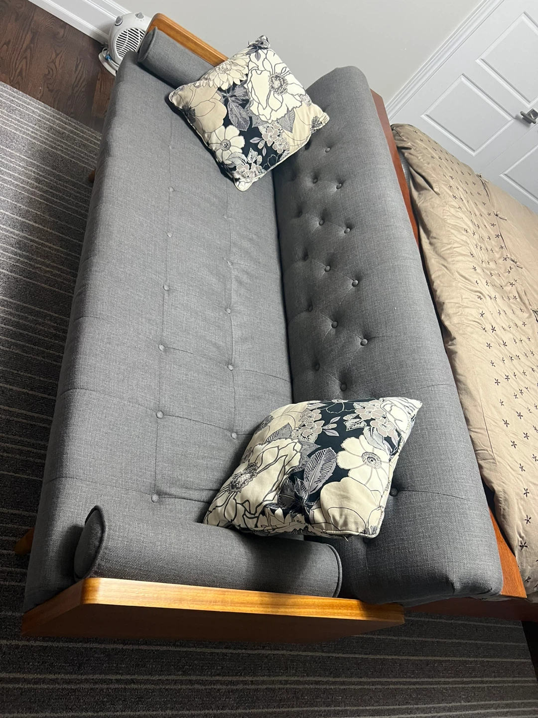 Grey Tufted Sofa with Wooden Accents