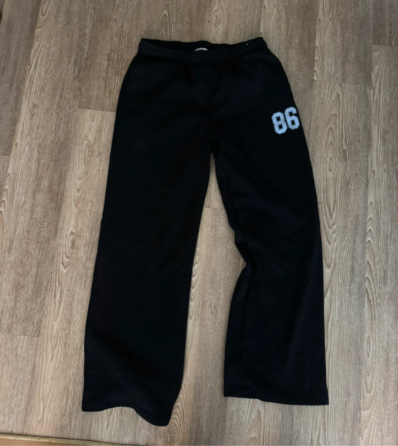 Black Sweatpants with '86' graphic