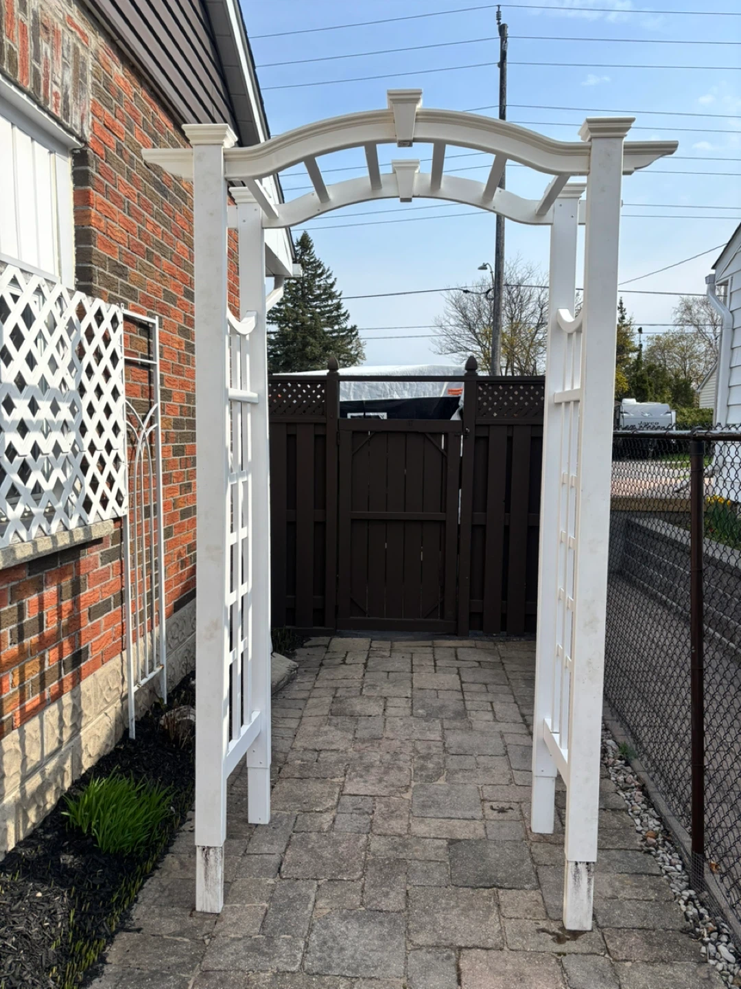 white vinyl arbor