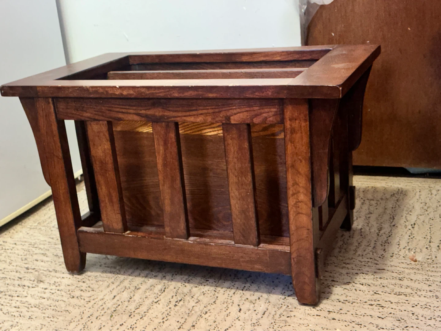 Arts and crafts period style newspaper holder
