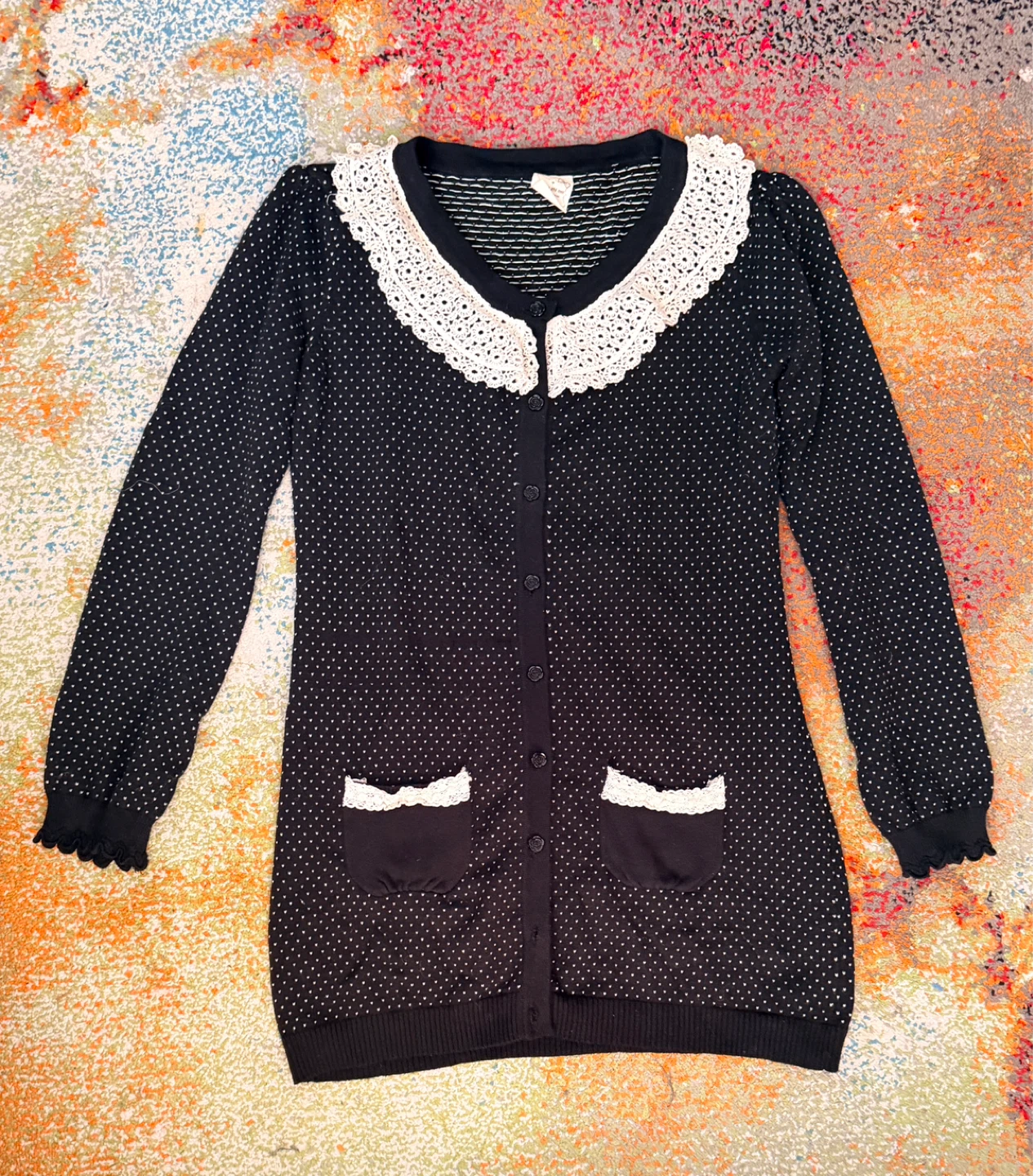 Black polka dot cardigan. Size M