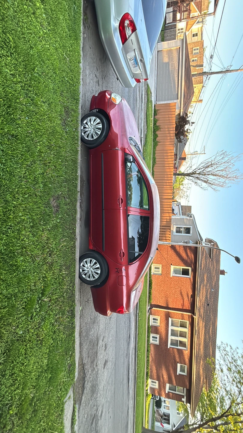 2005 Toyota Corolla Red Sedan 212.000 miles - photo 4