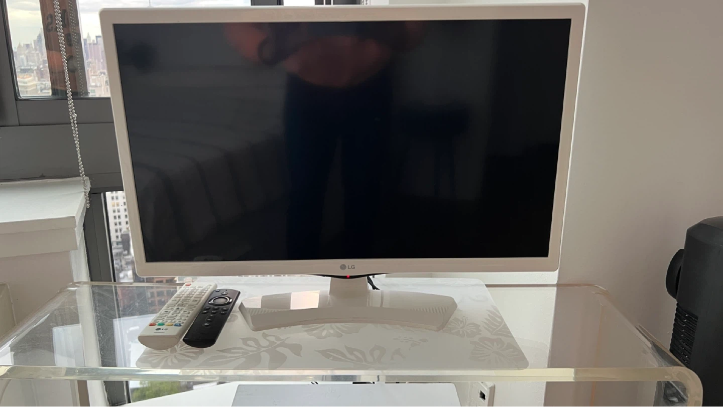 LG White Flat Screen TV 23.6-inch diagonal screen size.
