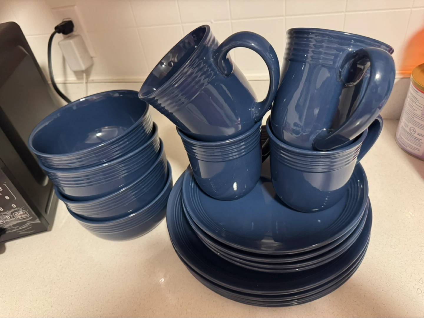 Set of 4 Blue Ceramic Mugs, Plates, and Bowls