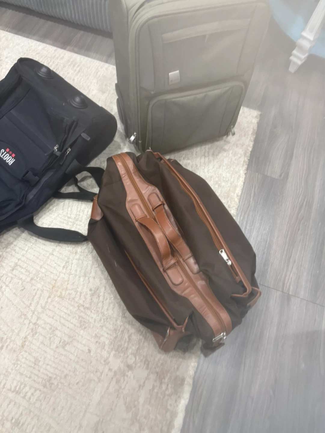 Roots backpack and two suitcases - photo 2