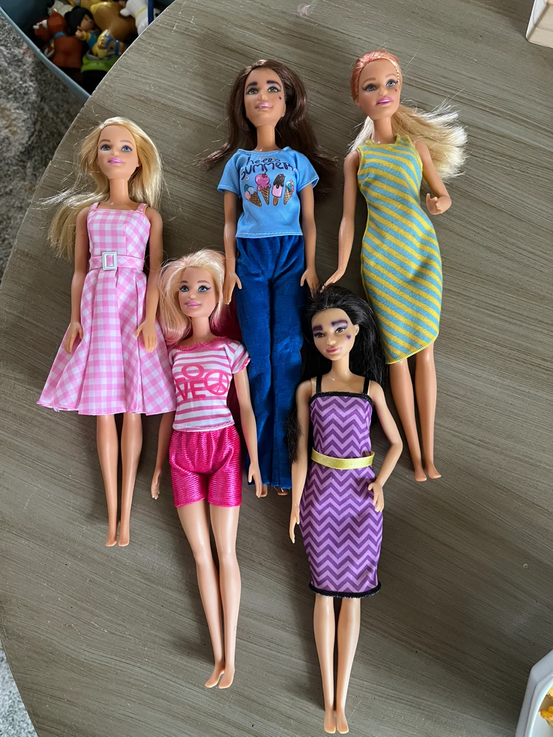5 Barbie Dolls