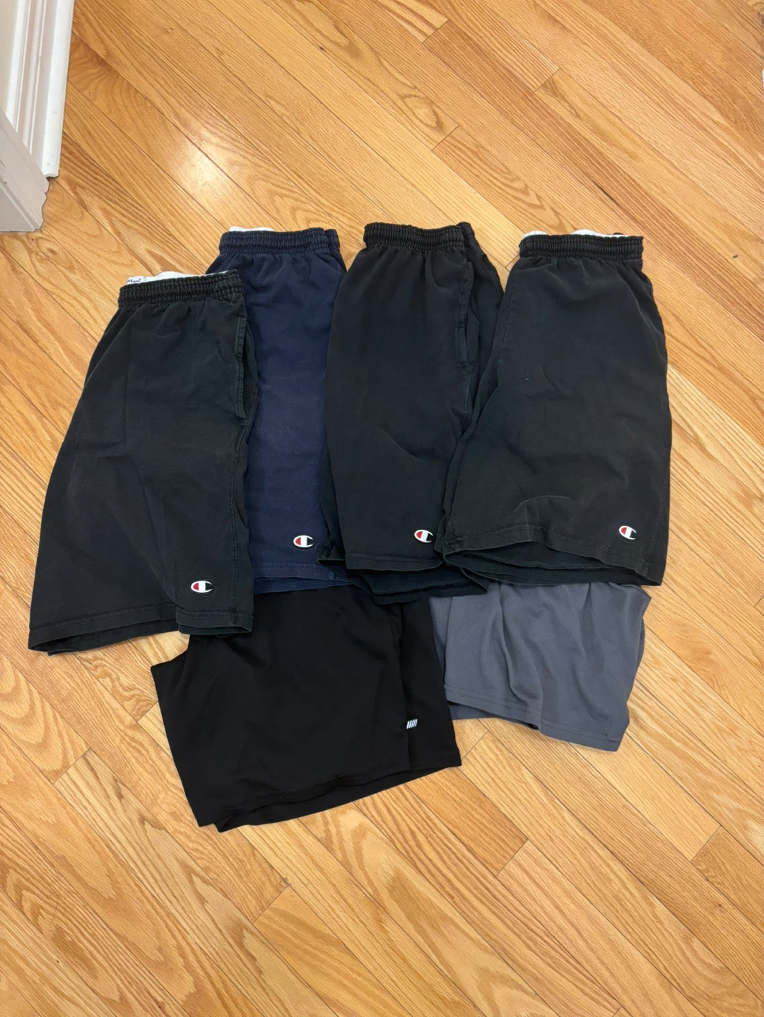 6 shorts all small size. 4 champions, 2 amazon essentials