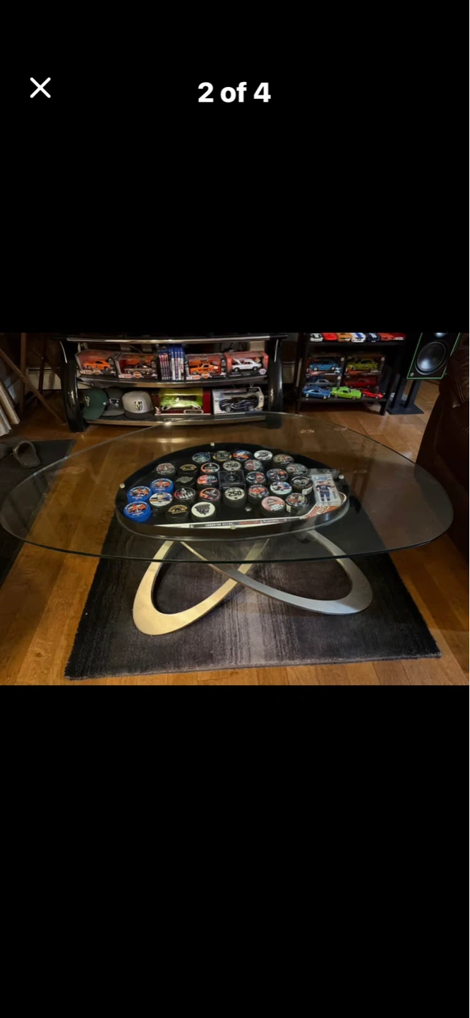Glass Coffee Table with Oval Top and Metal Base