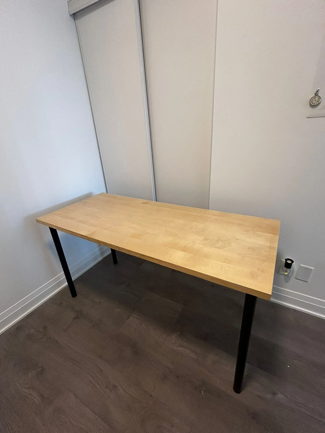 Wooden top table with black legs