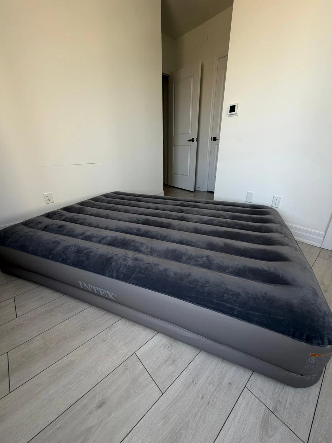 Intex Dura-Beam Standard Queen Air Mattress with Built-in Pump