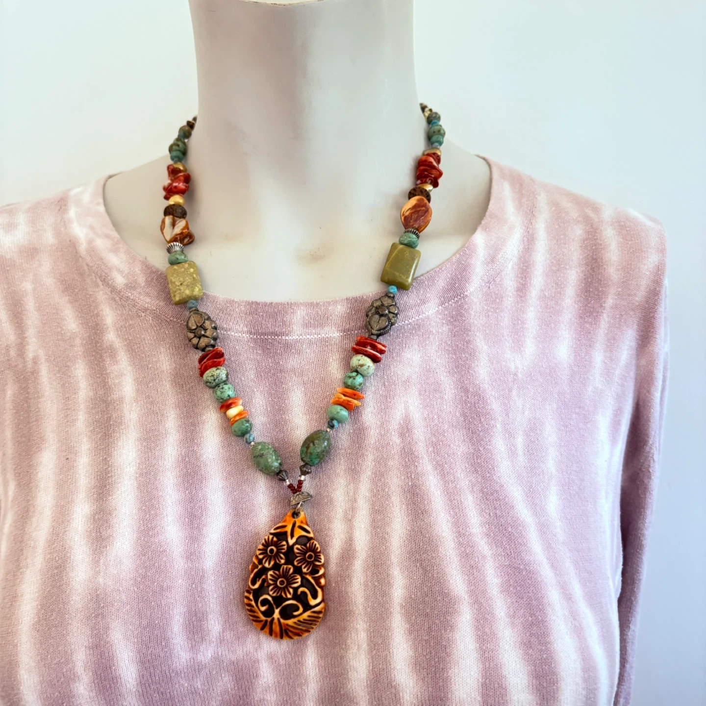 Beaded Necklace with Carved Pendant