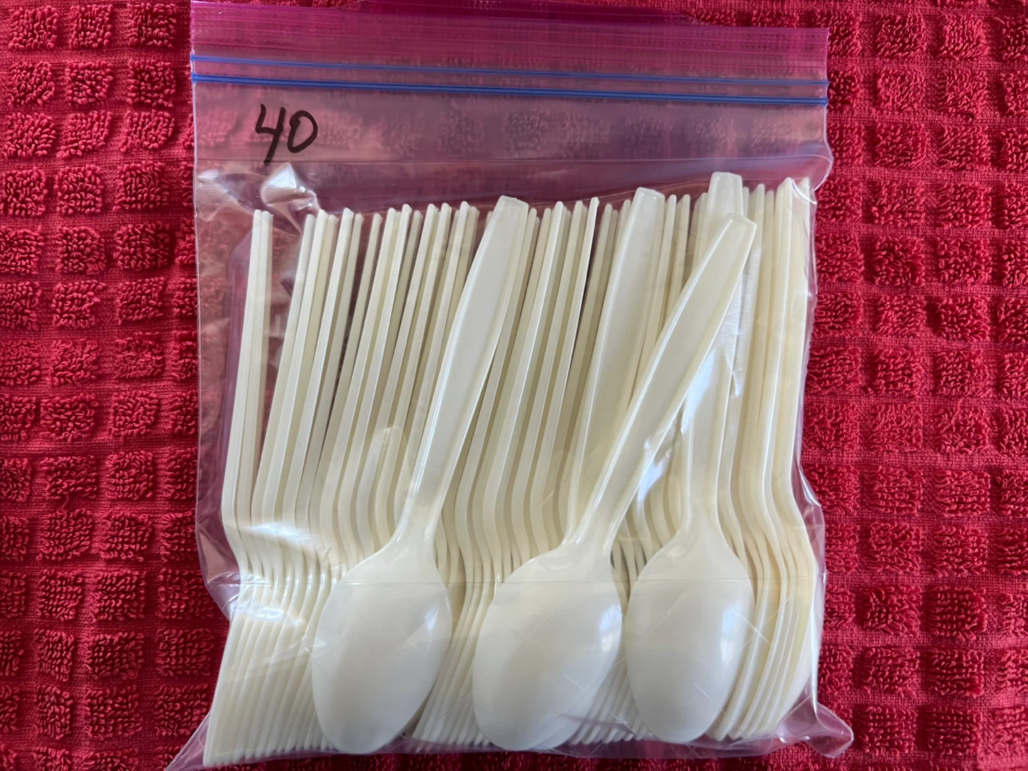Cream colored plastic spoons - New, never used