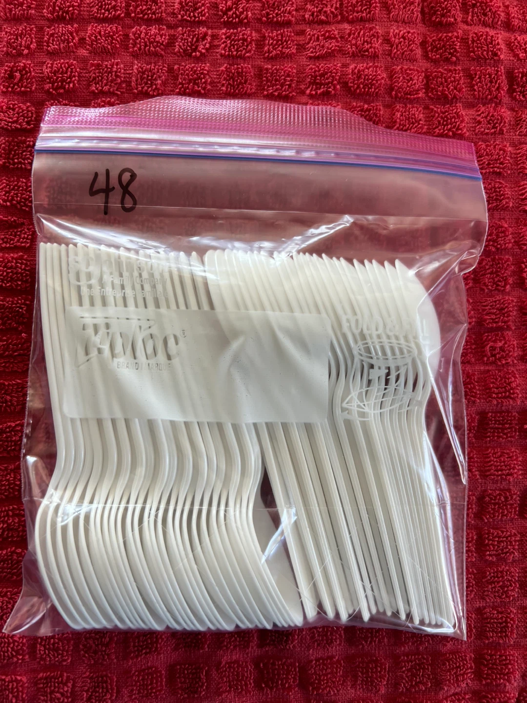 White plastic spoons