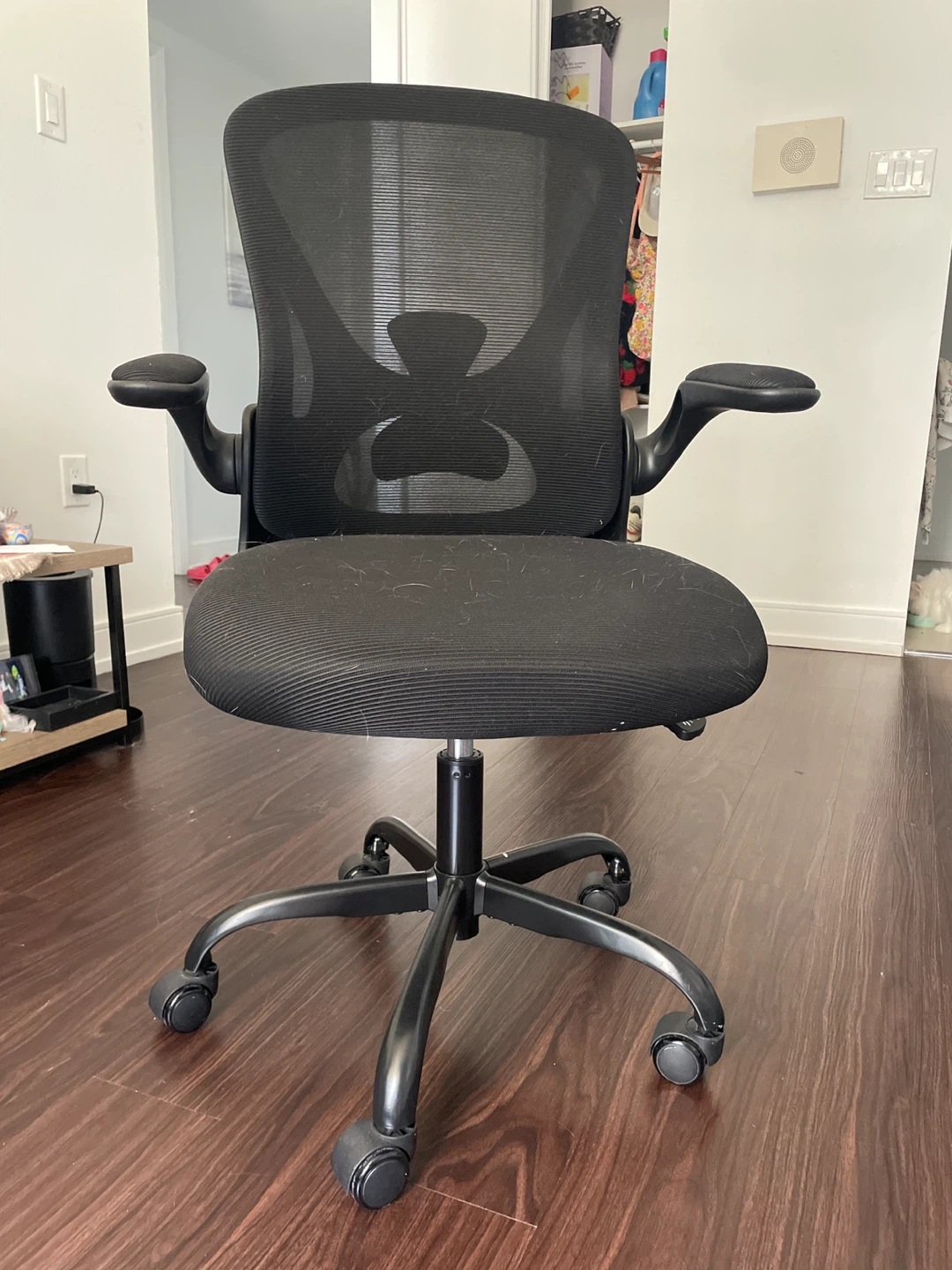 Black Mesh Office Chair with Flip-Up Arms