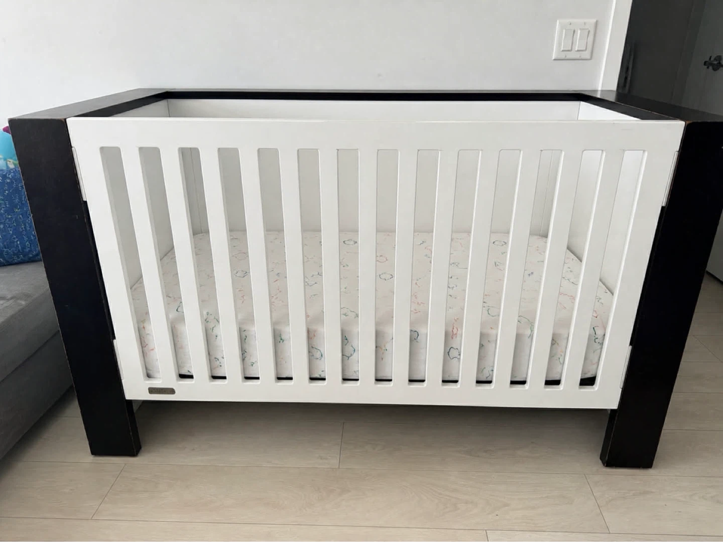 White and Dark brown Baby Crib