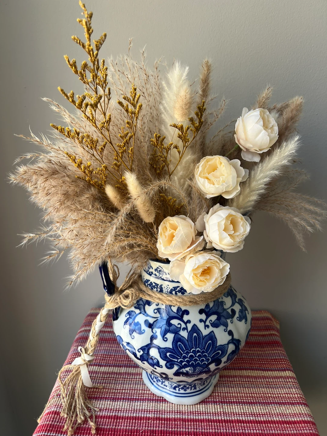 Artificial Flower Arrangement in Blue and White Vase