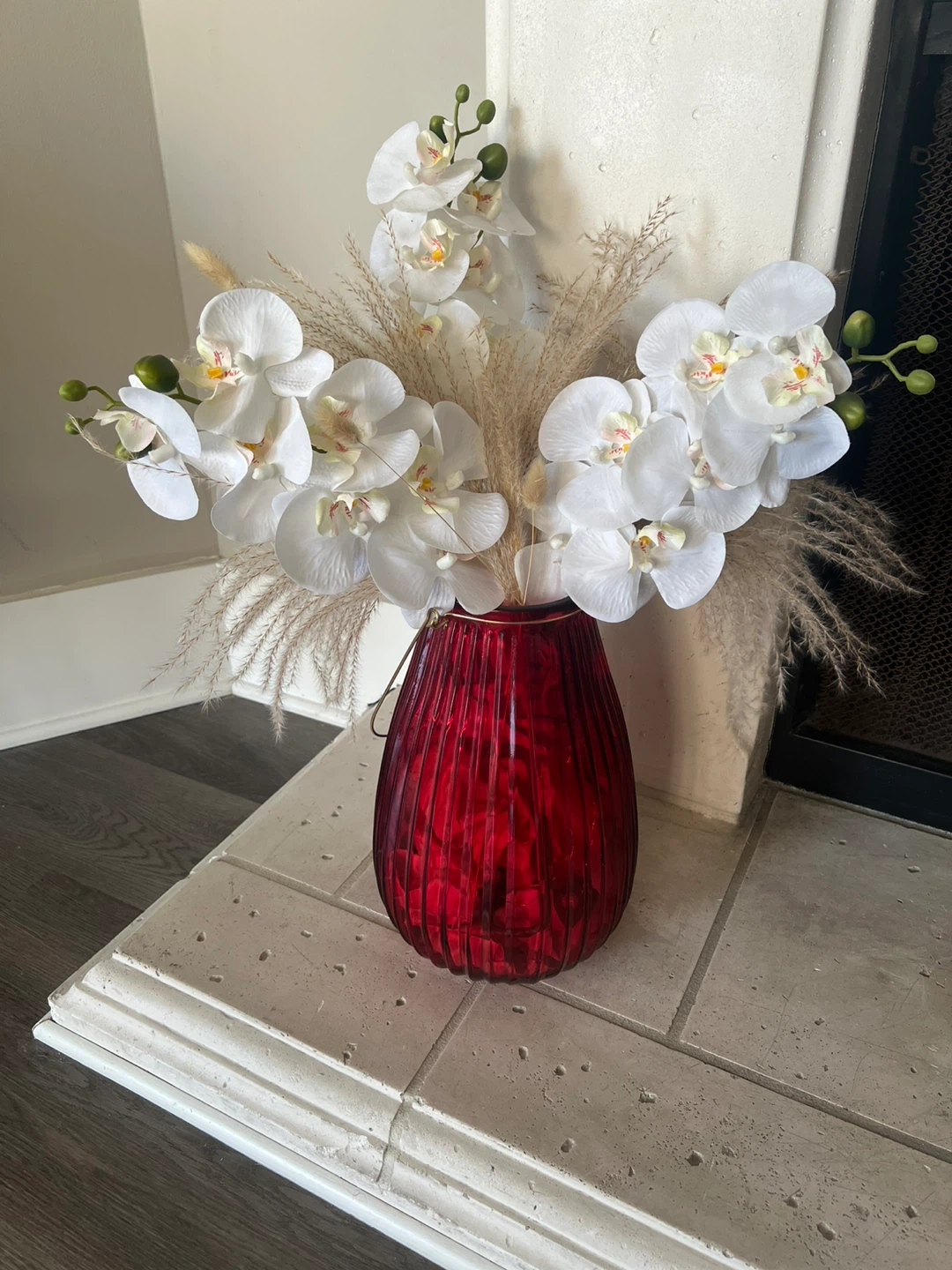 Artificial Orchid Arrangement in Red Glass Vase