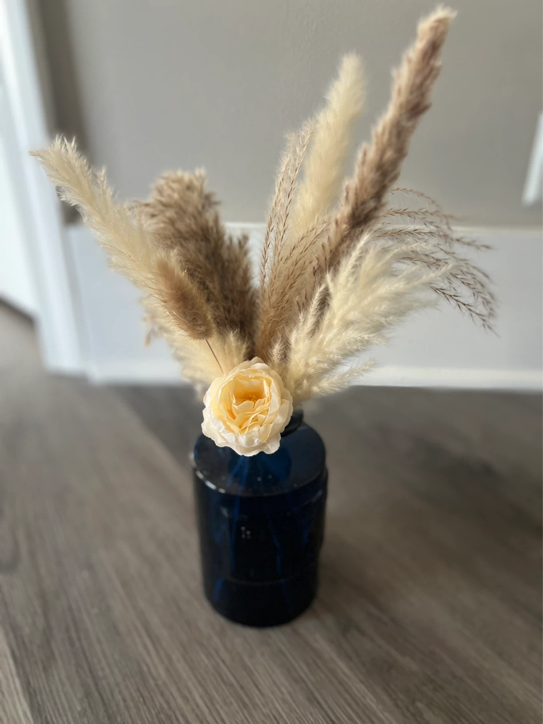 Pampas Grass and Rose Arrangement in Blue Vase
