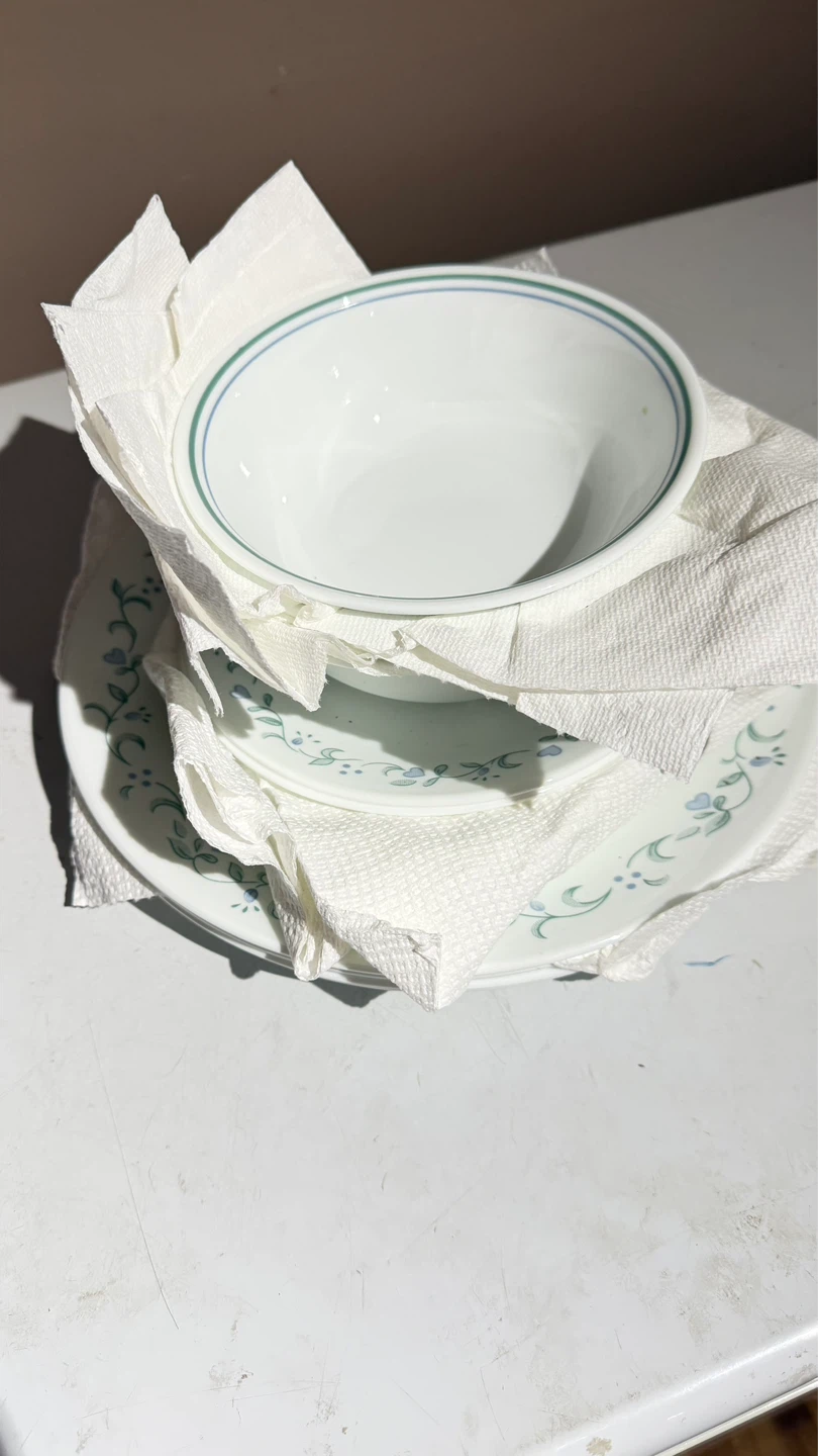 Four place setting Corelle Plates and Bowls