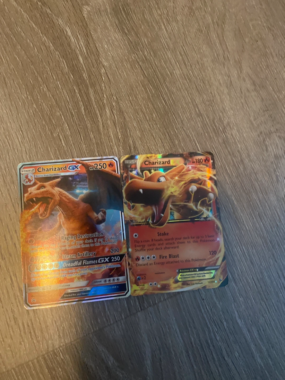 Pokemon Charizard GX and Charizard EX Trading Cards